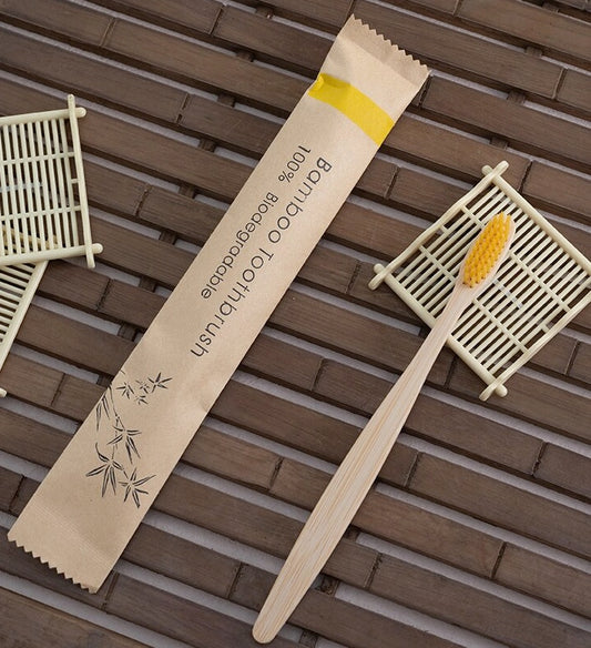 All Natural Bamboo Toothbrush with Charcoal Bristles in Yellow